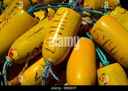 Crab trap floats and buoys pilled on a commercial fishing vessel