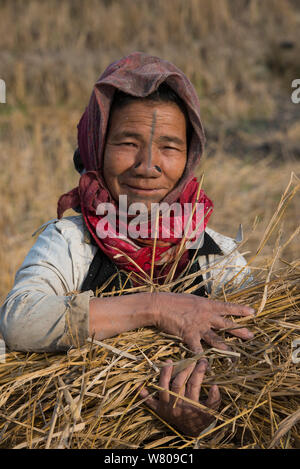 Woman from apatani tribe in a house from a small village near Ziro ...