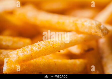 Macro closeup of french fries corn snacks sticks Stock Photo