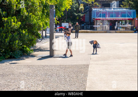 Nantes, France - May 12, 2019: Children play in the square near the Hangar des Machines of the Isle of Nantes, France Stock Photo