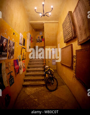 Old apartment hallway stairs going up Stock Photo
