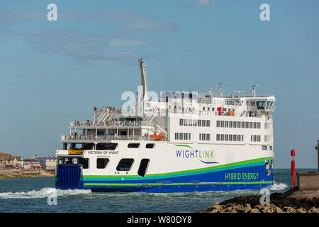 Wightlink's Hybrid Energy Car ferry Victoria of Wight leaving Portsmouth harbour. tern vine as the ship passes through the narrow channel. Stock Photo