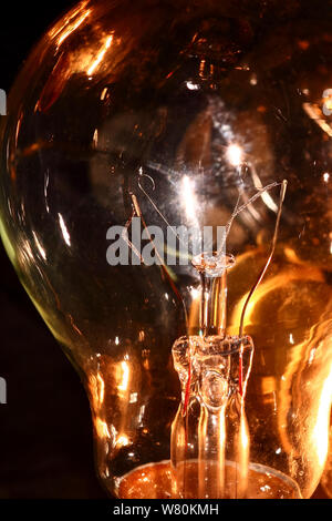 Close up of an electric lightbulbs broken tungsten filament Stock Photo