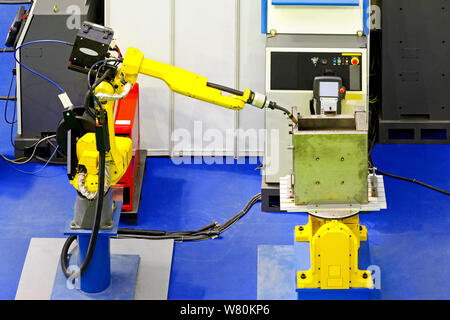 Automatic robotic arm for metal welding operation Stock Photo