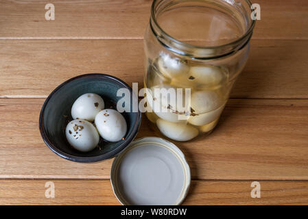 Pickled Eggs in a Bowl and a Jar Stock Photo