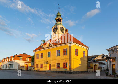 Town hall and well-preserved houses in the wooden city centre of the town of Rauma, Finland Stock Photo