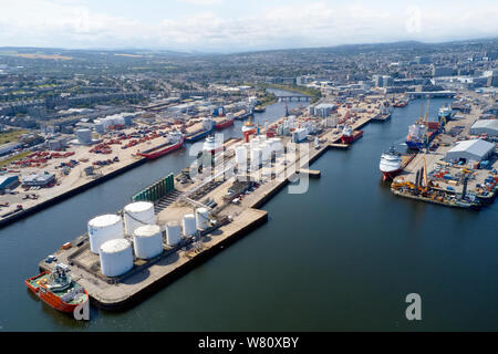 Aberdeen aerial view harbour ships with oil & gas tanks and north sea vessels Stock Photo