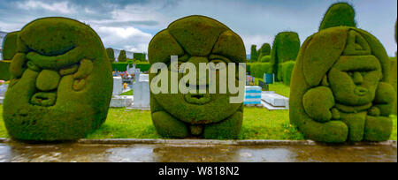 Tulum, Ecuador, Dec 11, 2017 - Exotic topiary created in Tulum cemetary in the North of Ecuador Stock Photo