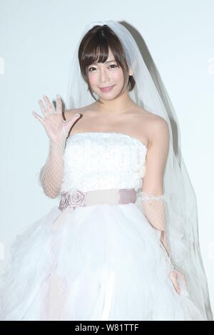 Japanese AV idol and model Mana Sakura attends a press conference to