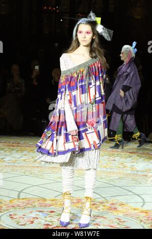 A model displays a creation by Vivienne Westwood on her Fall-Winter ...
