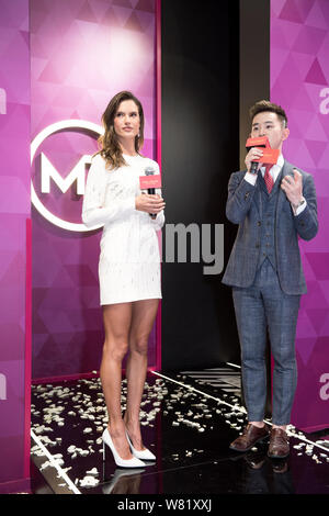 Brazilian model Alessandra Ambrosio, left, attends an unveiling ceremony of her own wax figure at the Madame Tussauds wax museum in Shanghai, China, 6 Stock Photo