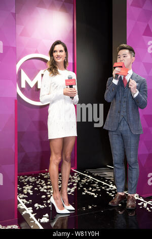 Brazilian model Alessandra Ambrosio, left, attends an unveiling ceremony of her own wax figure at the Madame Tussauds wax museum in Shanghai, China, 6 Stock Photo