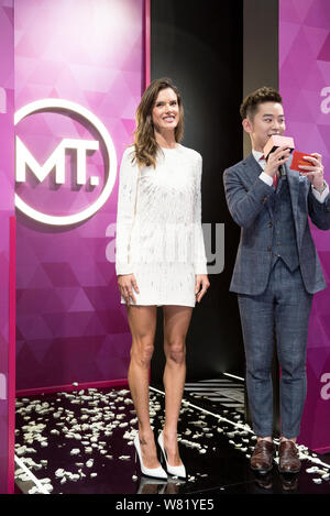 Brazilian model Alessandra Ambrosio, left, attends an unveiling ceremony of her own wax figure at the Madame Tussauds wax museum in Shanghai, China, 6 Stock Photo