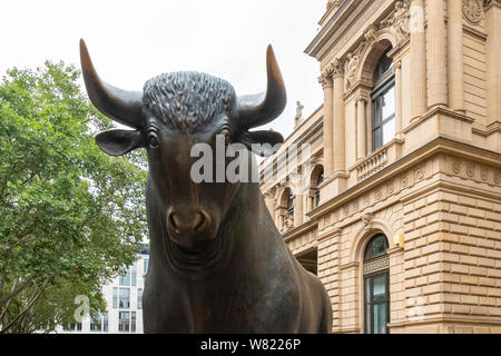 Bull stock market concept - statue of bull outside Frankfurt Stock Exchange, Frankfurt am Main, Germany, Europe Stock Photo