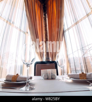 Served table for two persons in a restaurant. Stock Photo