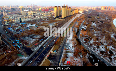 Aerial view of the construction site of an elevated road fully covered by noise-reduction shelters in Shenyang city, northeast China's Liaoning provin Stock Photo