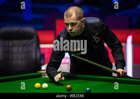 Barry Hawkins of England considers a shot to Ryan Day of Wales in their final match during the World Grand Prix Snooker 2017 in Preston, UK, 12 Februa Stock Photo