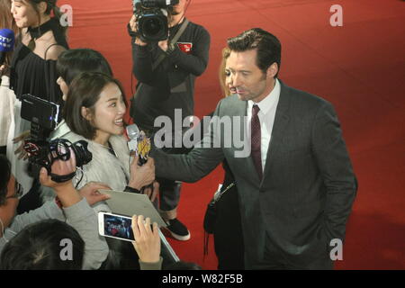 Australian actor Hugh Jackman is interviewed on the red carpet for a premiere of his new movie 'Logan' in Taipei, Taiwan, 27 February 2017. Stock Photo