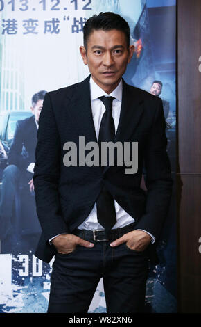 --FILE--Hong Kong singer and actor Andy Lau attends a promotional event for his movie 'Firestorm' in Beijing, China, 8 December 2013.   Andy Lau, one Stock Photo