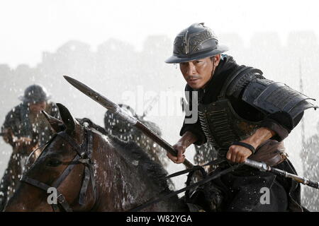 --FILE--Still of the movie 'Three Kingdoms: Resurrection of the Dragon' showing Hong Kong singer and actor Andy Lau riding a horse.   Andy Lau, one of Stock Photo