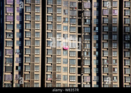 A view of a high-rise residential apartment building in Huai'an city, east China's Jiangsu province, 14 January 2017.  Prices of new homes in China gr Stock Photo