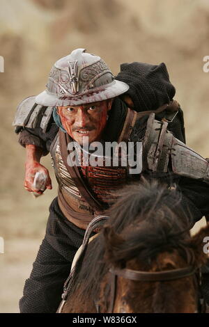 --FILE--Still of the movie 'Three Kingdoms: Resurrection of the Dragon' showing Hong Kong singer and actor Andy Lau riding a horse.   Andy Lau, one of Stock Photo