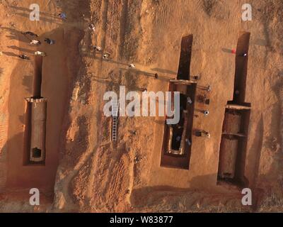 Aerial view of the excavation site of ancient tombs spanning from Shang Dynasty (1600-1046 BC) to Ming Dynasty (1368-1644) at Xintang county in Guangz Stock Photo