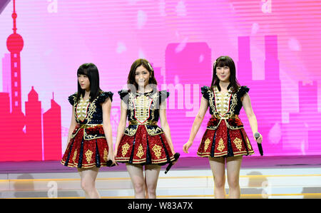 (From left) Saya Kawamoto, Mayu Watanabe and Rina Izuta of Japanese girl group AKB48 perform at a fan meeting in Shanghai, China, 10 December 2016. Stock Photo