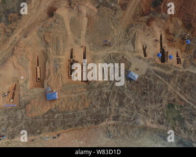 Aerial view of the excavation site of ancient tombs spanning from Shang Dynasty (1600-1046 BC) to Ming Dynasty (1368-1644) at Xintang county in Guangz Stock Photo