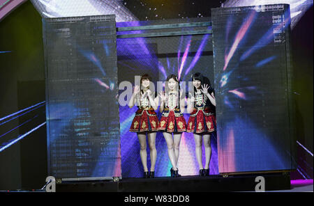 (From left) Rina Izuta, Mayu Watanabe and Saya Kawamoto of Japanese girl group AKB48 attend a fan meeting in Shanghai, China, 10 December 2016. Stock Photo