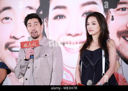 Taiwanese actress Shu Qi, right, and Chinese actor Wang Qianyuan attend a press conference for their movie 'The Village Of No Return' in Taipei, Taiwa Stock Photo