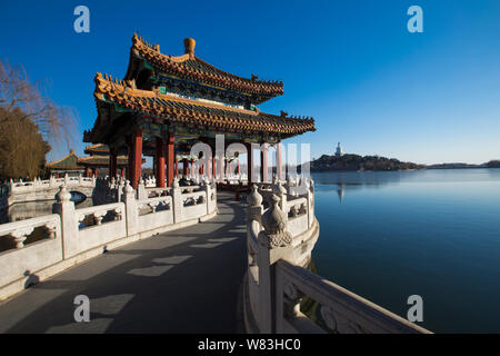 A view of the Beihai Park under the blue sky during a clear day in Beijing, China, 22 December 2016.   Blue skies returned to Beijing on Thursday (22 Stock Photo