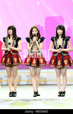 (From left) Rina Izuta, Mayu Watanabe and Saya Kawamoto of Japanese girl group AKB48 attend a fan meeting in Shanghai, China, 10 December 2016. Stock Photo