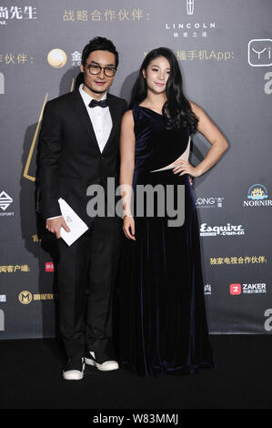 Chinese diving couple Qin Kai, left, and He Zi arrive on the red carpet for the Esquire Man at his Best Awards 2016 in Beijing, China, 7 December 2016 Stock Photo
