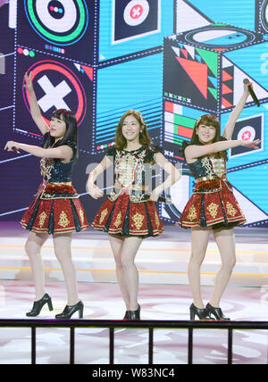 (From left) Saya Kawamoto, Mayu Watanabe and Rina Izuta of Japanese girl group AKB48 perform at a fan meeting in Shanghai, China, 10 December 2016. Stock Photo