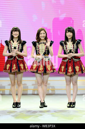 (From left) Rina Izuta, Mayu Watanabe and Saya Kawamoto of Japanese girl group AKB48 attend a fan meeting in Shanghai, China, 10 December 2016. Stock Photo