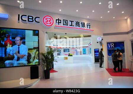 --FILE--People visit the stand of ICBC (Industrial and Commercial Bank of China) during an exhibition in Beijing, China, 27 October 2016.   Industrial Stock Photo