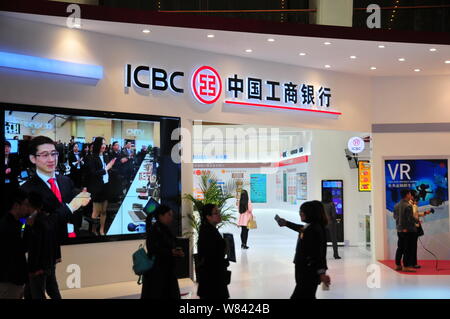 --FILE--People visit the stand of ICBC (Industrial and Commercial Bank of China) during an exhibition in Beijing, China, 27 October 2016.   Industrial Stock Photo