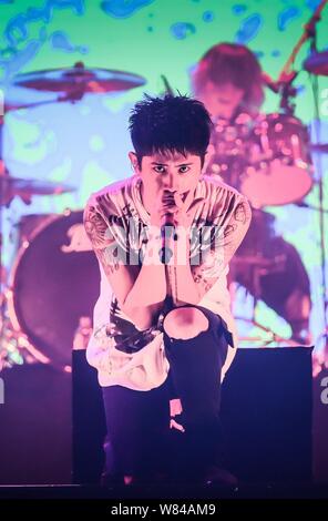 A Member Of Japanese Rock Band One Ok Rock Performs At A Concert In Shanghai China 22 November 16 Stock Photo Alamy