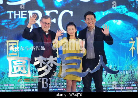 American director Steven Spielberg, left, Chinese actor Huang Lei, right, and his daughter Huang Yici attend a press conference for the movie 'The BFG Stock Photo