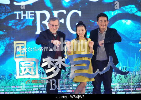 American director Steven Spielberg, left, Chinese actor Huang Lei, right, and his daughter Huang Yici attend a press conference for the movie 'The BFG Stock Photo