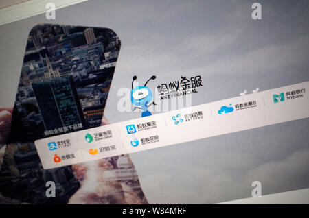 --FILE--A Chinese netizen looks at a logo of Ant Financial Services, an affiliate of Chinese e-commerce giant Alibaba Group, on his computer in Jinan Stock Photo