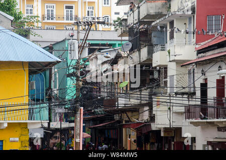 A tangle of cables is seen between the old buildings of Salsipuedes between Santa Ana (right) and Casco Antiguo (left). Stock Photo