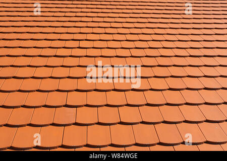Top view of a brand new red roof tile Stock Photo