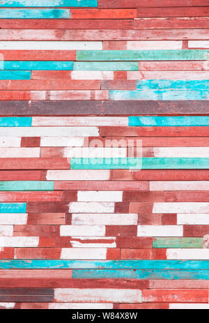 Wall background of old aged weather-beaten boards painted in bright colors. The art of drawing a background decoration. Decoration of beach-style boar Stock Photo