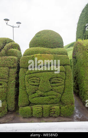 Tulum, Ecuador, Dec 11, 2017 - Exotic topiary created in Tulum cemetary in the North of Ecuador Stock Photo