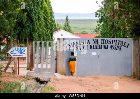 Sign points to the catholic St. Clare Clinic of the German missionary doctor Thomas Brei, in Mwanza, Tanzania, Africa Stock Photo