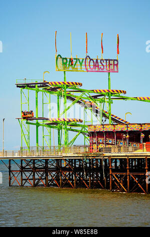 Riding the Crazy Coaster(formerly Crazy Mouse) on South Pier in  summer Stock Photo