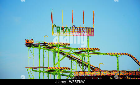 Riding the Crazy Coaster(formerly Crazy Mouse) on South Pier in  summer Stock Photo