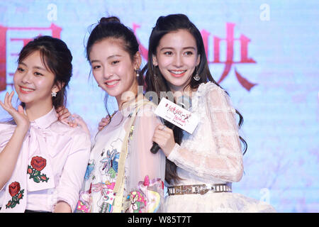 Hong Kong model and actress Angelababy, left, and Chinese singer and actor Kris  Wu or Wu Yifan pose with their trophies during the presentation ceremo  Stock Photo - Alamy